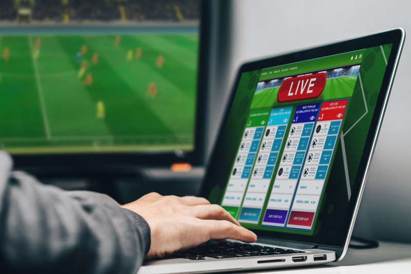 Live Sports Betting Data on Laptop